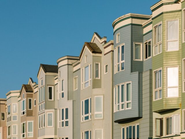 High-rise residential block against a clear sky